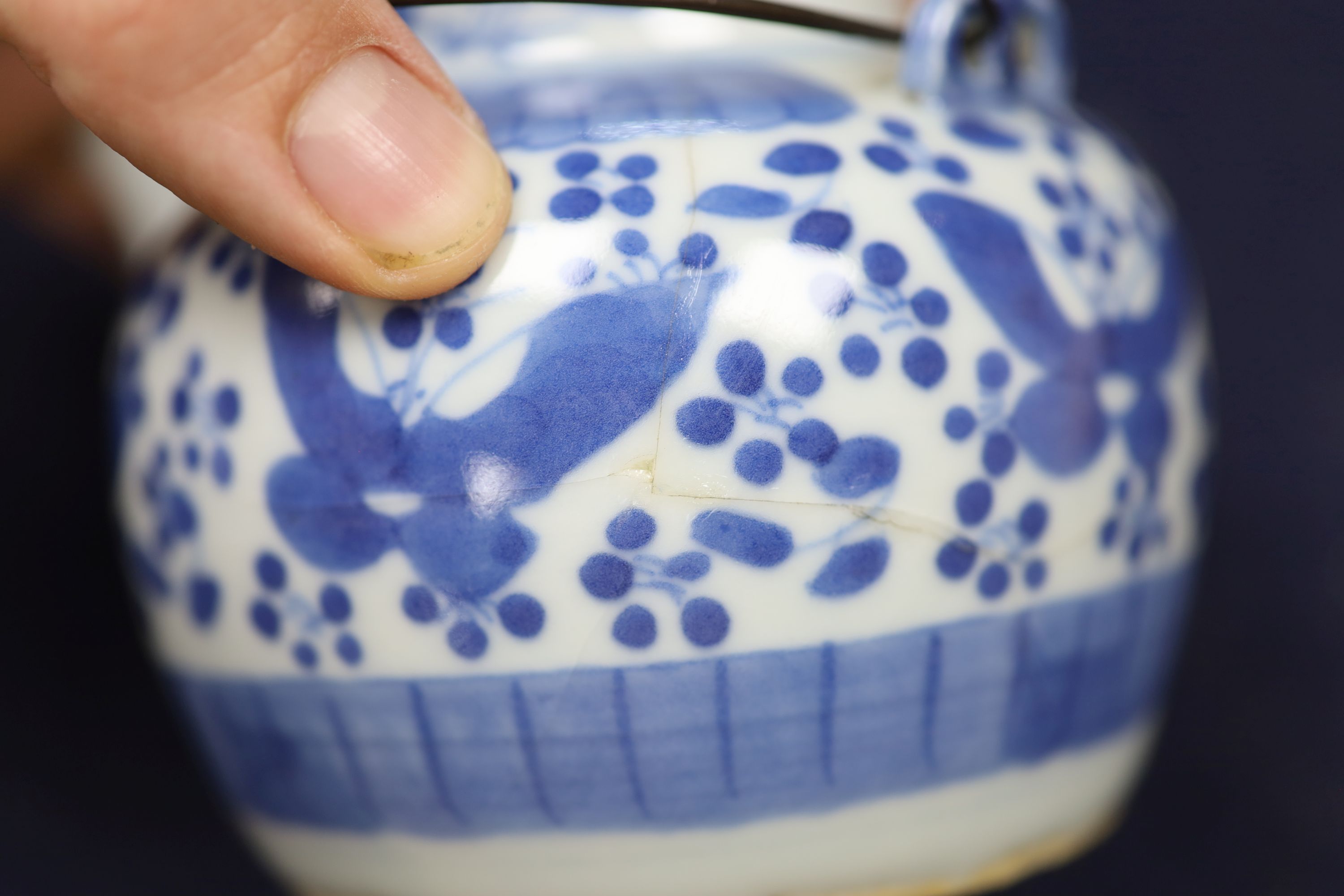 Two 19th century Chinese blue and white moon flasks and a teapot, tallest 21cm